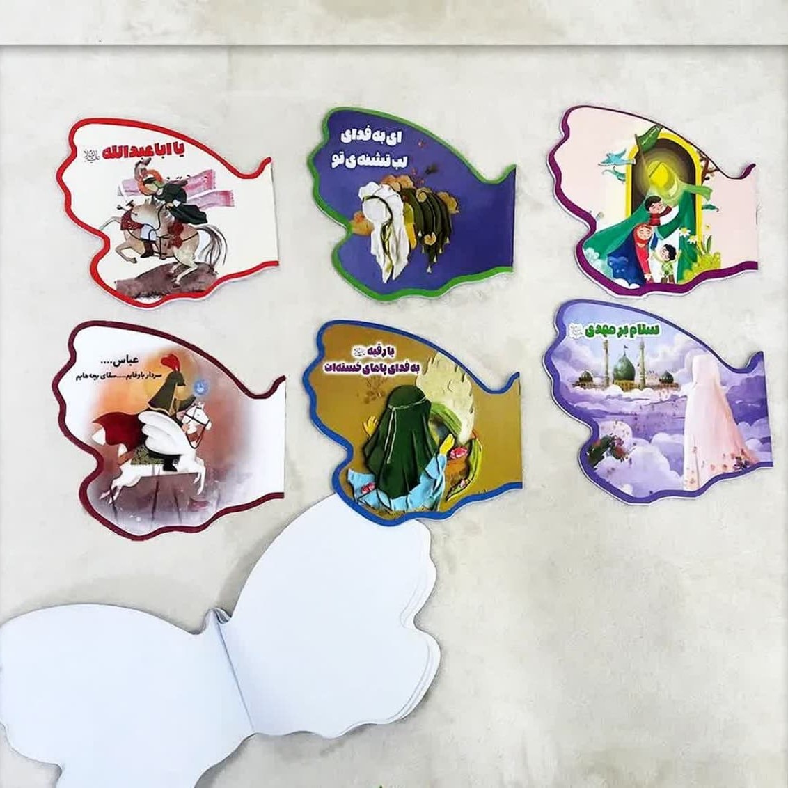 v2HyvdUZegG2gKh2ekUGANR5bAvwVccnYqP7KB0MJcq63AST0E.jpg دفترچه نقاشی پروانه ای محرمی - Image 1